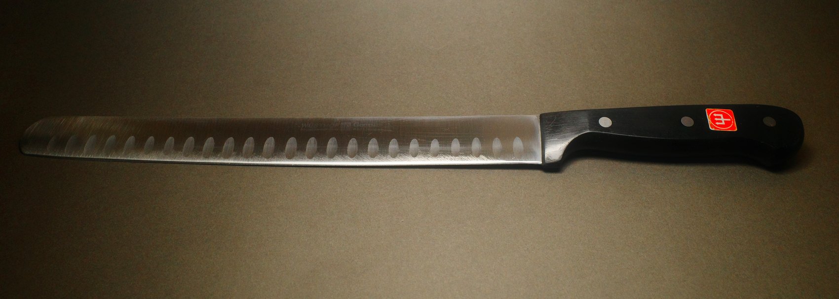 The same slicer after sharpening, clean and razor sharp