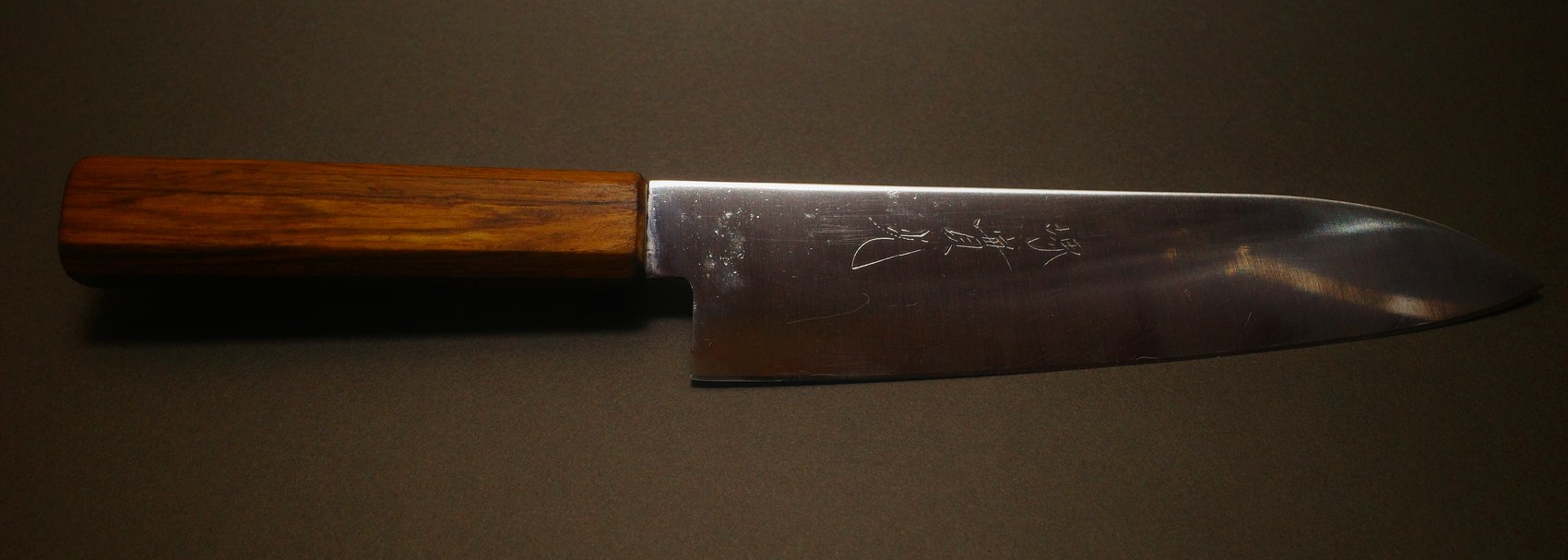 The same chef knife after sharpening, clean and razor sharp