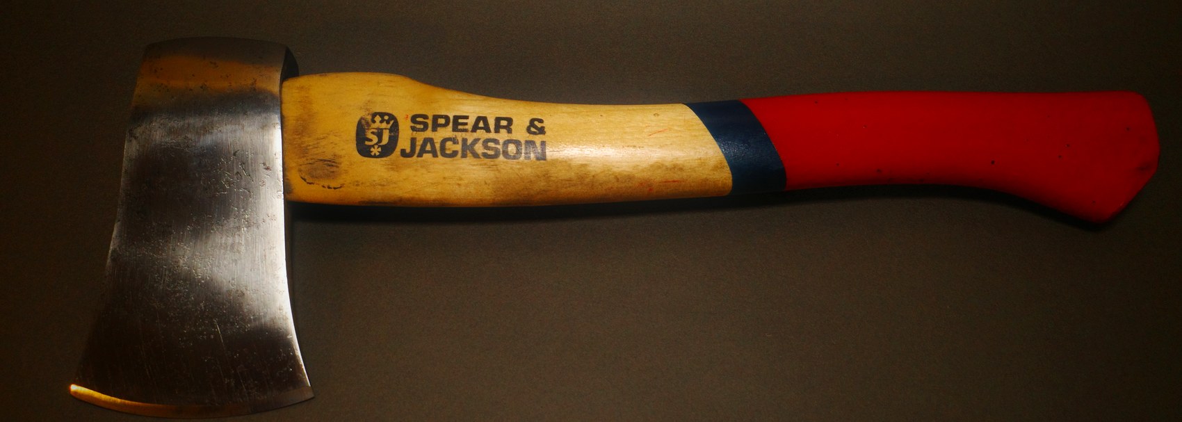 The same hatchet after restoration, rust removed and a clean sharp edge
